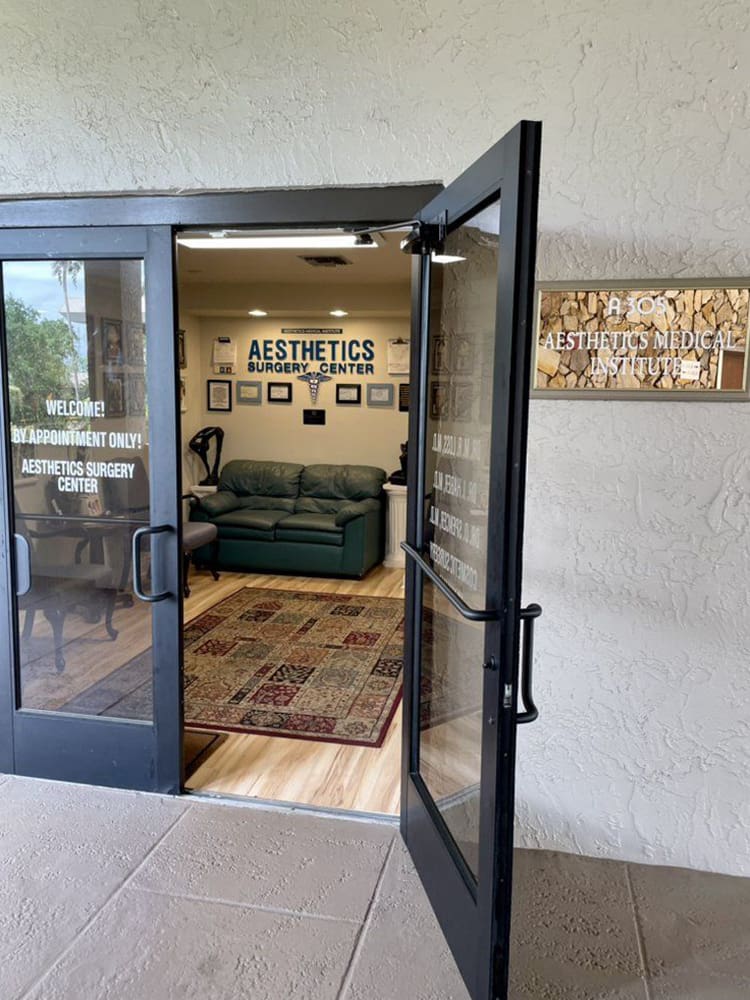 A door open to the living room of an apartment.